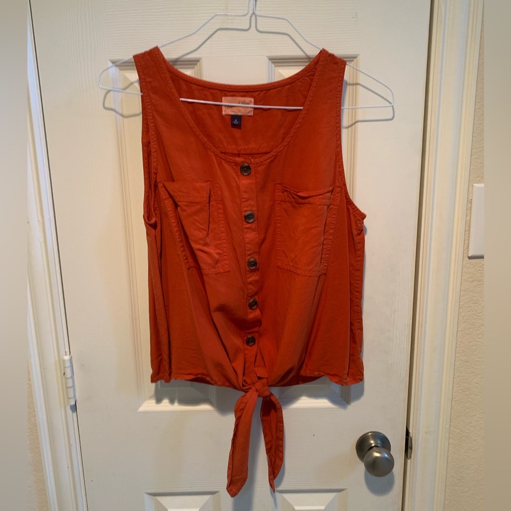 Sleeveless button up tie top